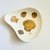 A mid century ceramic dish by Sascha Brastoff. Nice organic shape with a shell design of silver and gold shells on the...