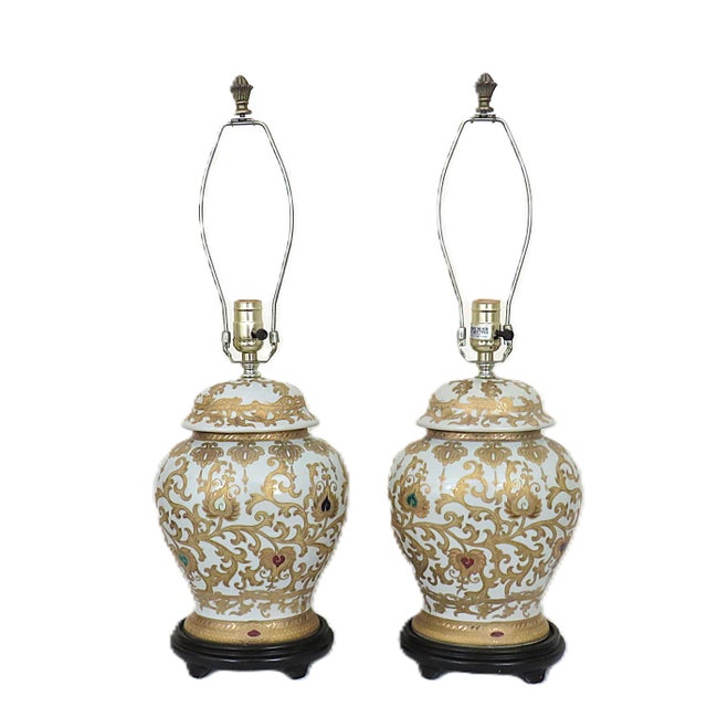 FREE SHIPPING ANYWHERE IN THE CONTINENTAL US! This is a set of Chinoiserie ginger jar table lamps. Porcelain. Late 20th...