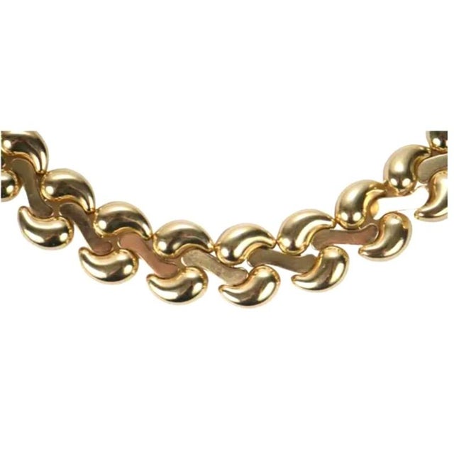 Heavy Solid 14K Gold Italian Vintage Ladies Necklace with integrated clasp. Necklace showcases a bold sculptural link...