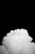 Black Clouds II captures a striking contrast between a billowing white cloud and a deep black background, emphasizing the...