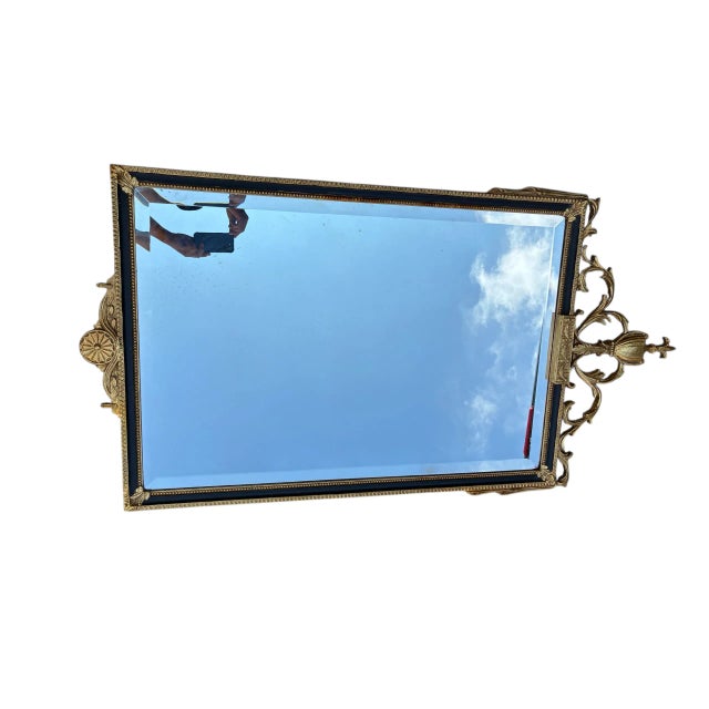 Excellent shape. Minor wear. The mirror is showing reflection from the photos being taken outdoors. The mirror is clear....