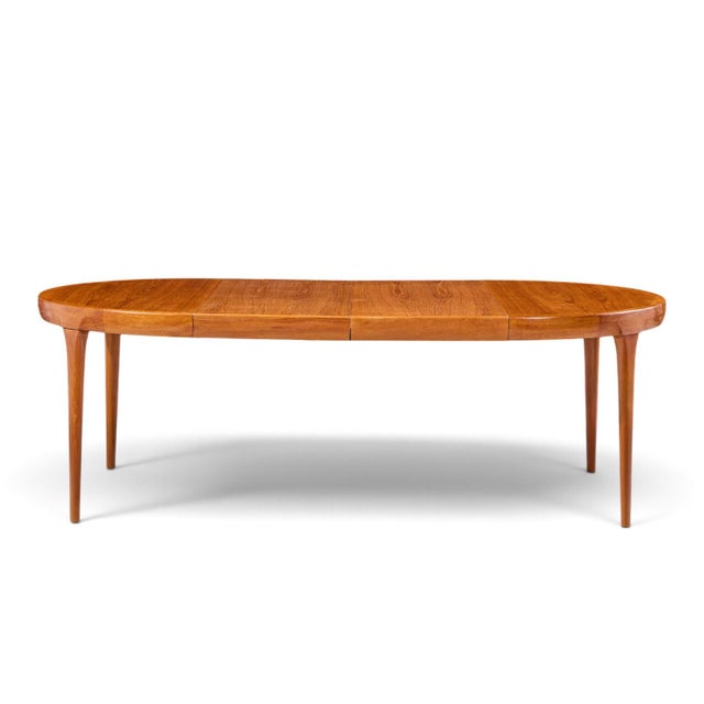 Kofod Larsen for Faarup Møbelfabrik Mid Century Danish Teak Expanding Dining Table with 2 Leaves This table measures:...