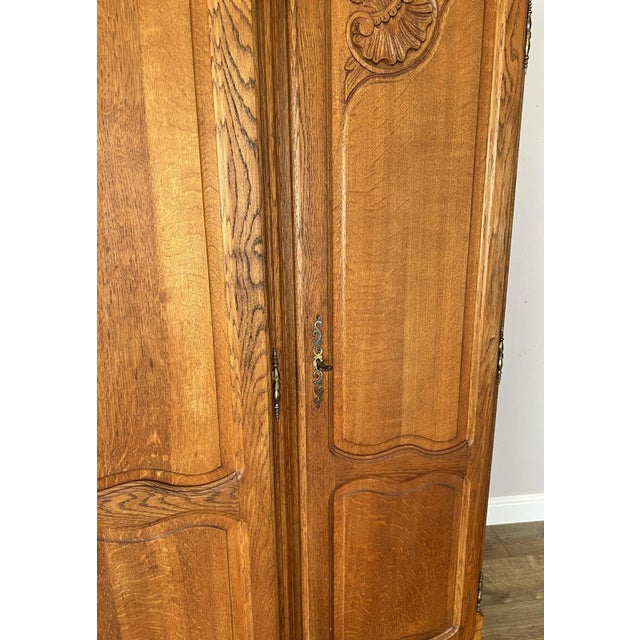 Vintage Louis XVI French Oak Four Door Carved Wardrobe For Sale - Image 9 of 12