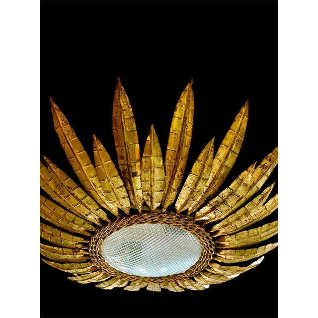 Large Spanish crown light in gilt metal and frosted glass. Spain, 1950s. Midcentury antique gilt iron frame or pendant...