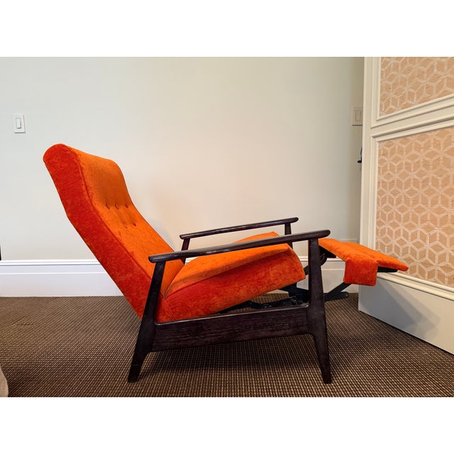 Walnut reclining chair in orange chenille fabric Attributed to Milo Baughman for Thayer Coggin. This piece is unsigned.