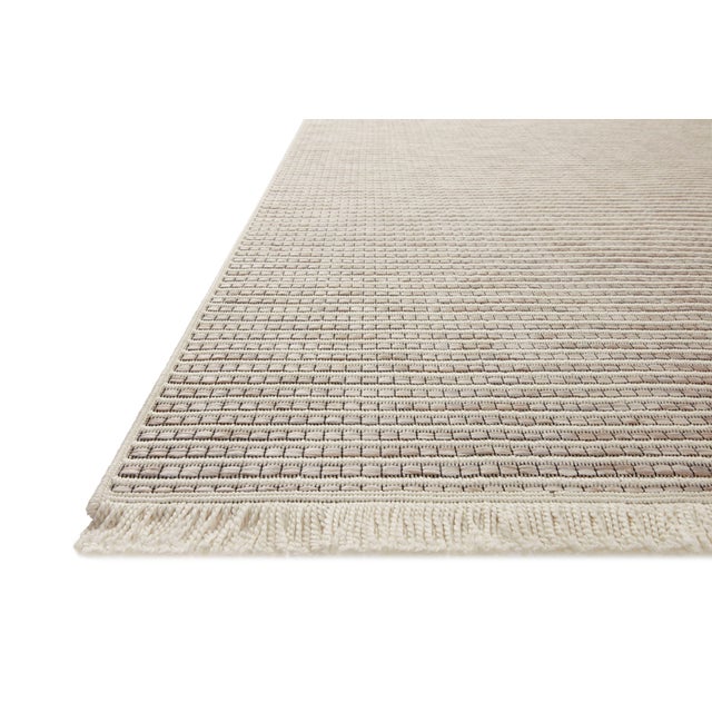 The Malibu Collection is an indoor/outdoor area rug by Amber Lewis x Loloi that channels the casual modern vibe of the...