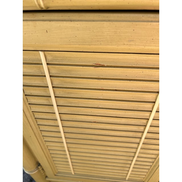 1970's Henry Link Bali Hai cabinet and hutch combination. The cabinet features louvered doors with bamboo inspired trim....