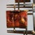 A sculptural contemporary Brutalist wall mirror made up of hand welded elements. The patinated metal frame features...