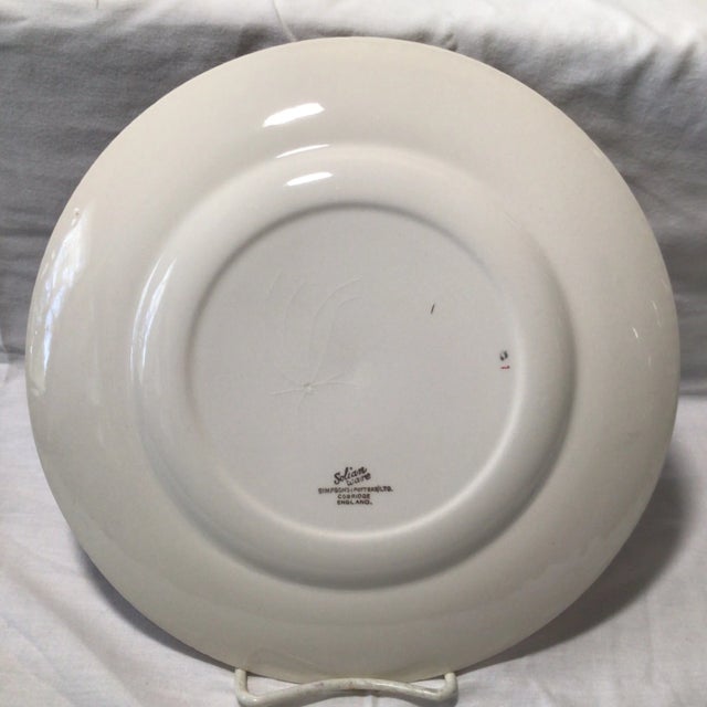 Here is a Schnauzer dog on a Salian Ware collectors plate with a wall plate holder made in Cambridge England by Simpson...