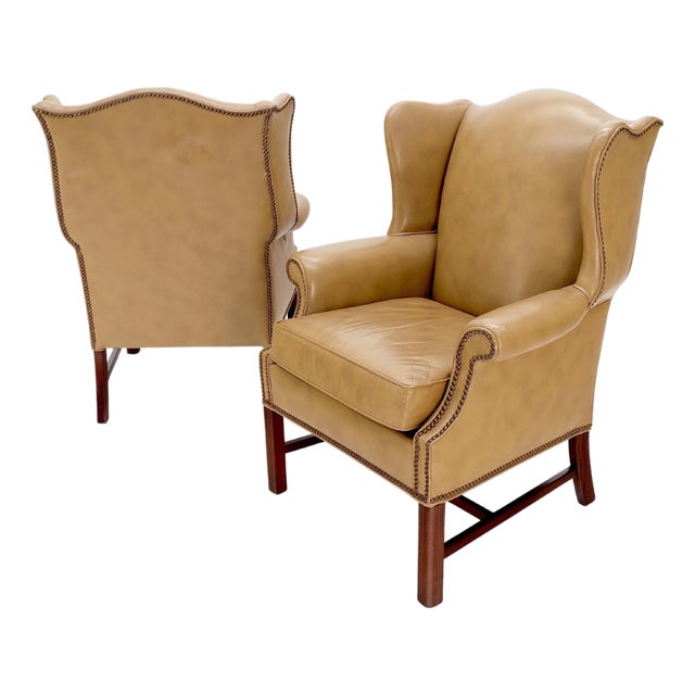 Pair of Tall Tan Leather Wing Chairs on Solid Mahogany Stretcher Base Mint! For Sale