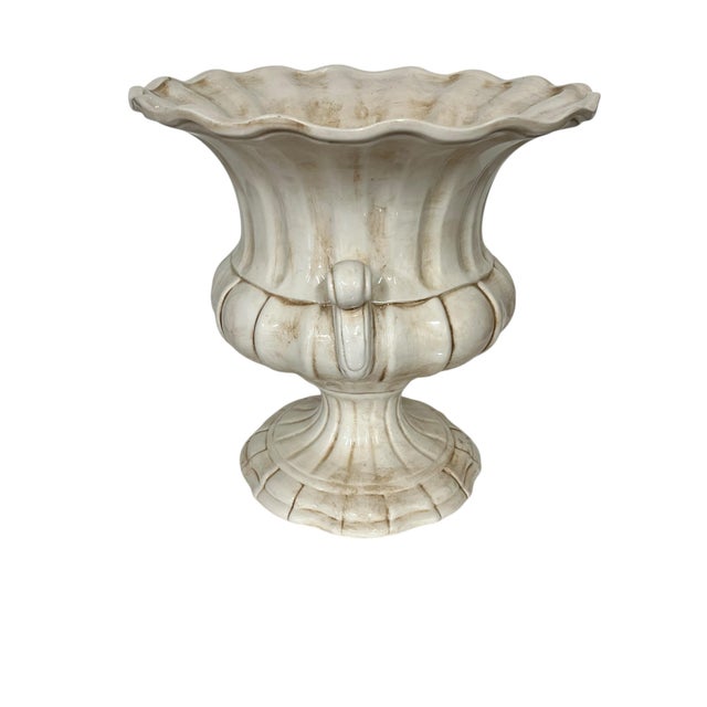 Large italian urn with aged finish. The large size adds to its stately appearance. Great container for orchids and other...