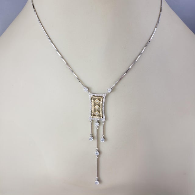18 Karat White and Yellow Gold and Diamond Art Deco Style Pendant Necklace- Radiating vintage-inspired elegance, this...