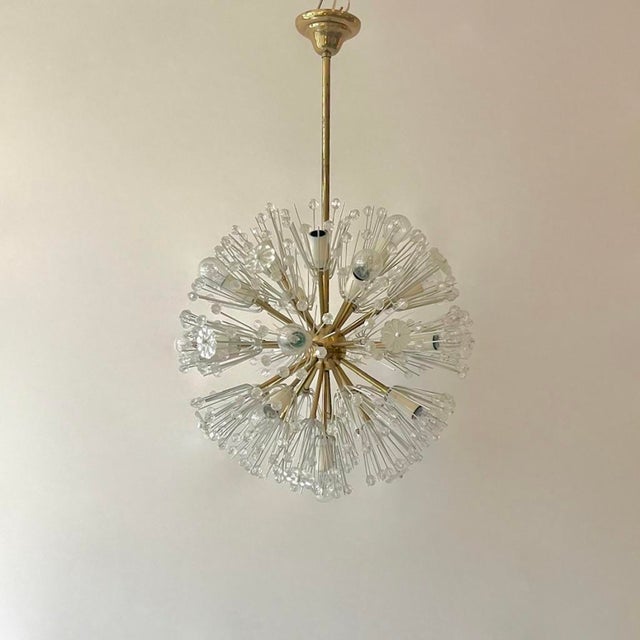Superb Snowball Sputnik chandelier with 13 lights, 50 cm in diameter, 80 cm in height. Brass and crystal by Emil Stejnar,...