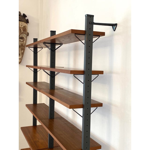 A shelving system * Bookshelf set from the high-quality Pira shelving system in the String style * Made of teak *...