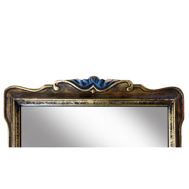 A Charming Small Gold Covered Wood Framed Wall Mirror circa 1940's. A small touch of Blue at the top center. An Unusual...