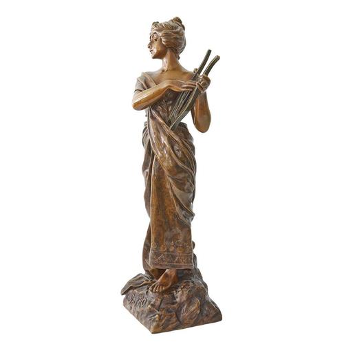 Sapho a large art nouveau sculpture by emmanuel villanis of sapho playing her lyre, with her loose fitted garment falling...