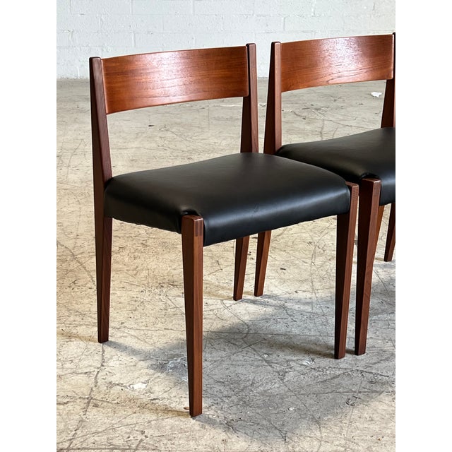 Beautifully constructed set of vintage Danish teak dining chairs featuring curved back newly refinished wood and new...