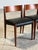Beautifully constructed set of vintage Danish teak dining chairs featuring curved back newly refinished wood and new...
