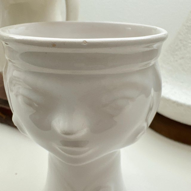 Beautiful vintage ceramic face vase featuring a sculptural design. Simple, minimal, and artistic. A statement piece that...