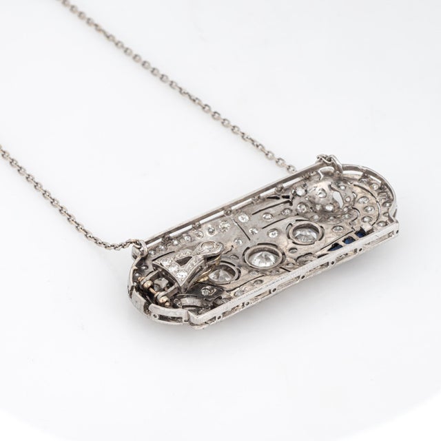 Finely detailed vintage Art Deco era diamond necklace (circa 1920s to 1930s), crafted in 14 karat white gold (chain) and...