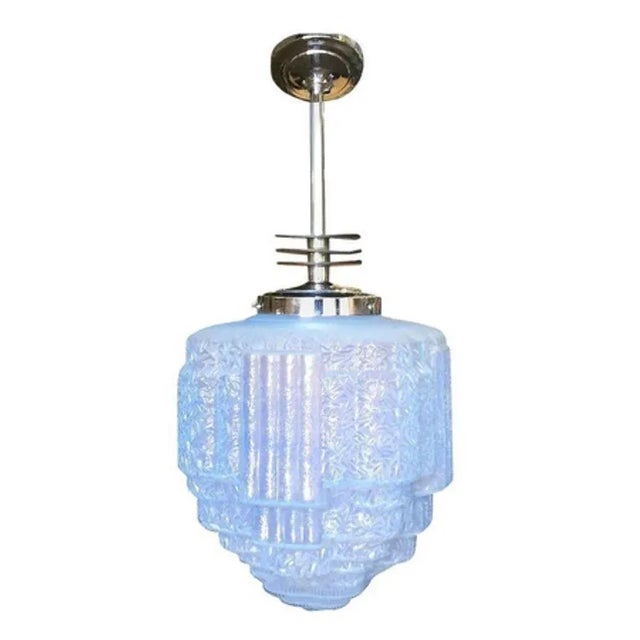 Rare Art Deco chrome ceiling pendant featuring a long four-and-a-half-foot chromed streamline light fixture with enameled...
