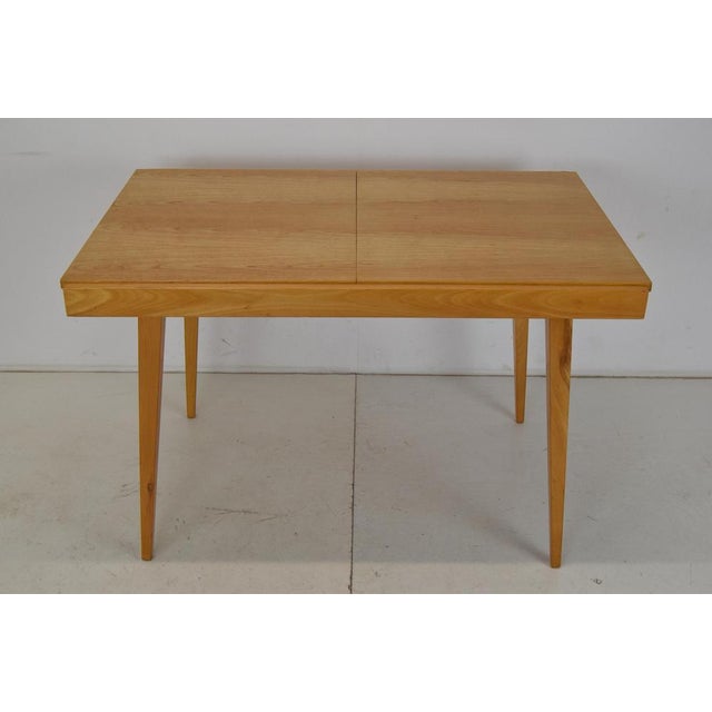 Made in Czechoslovakia. Made of ash wood. Expanded has width 170cm. Original condition. This piece is attributed to the...