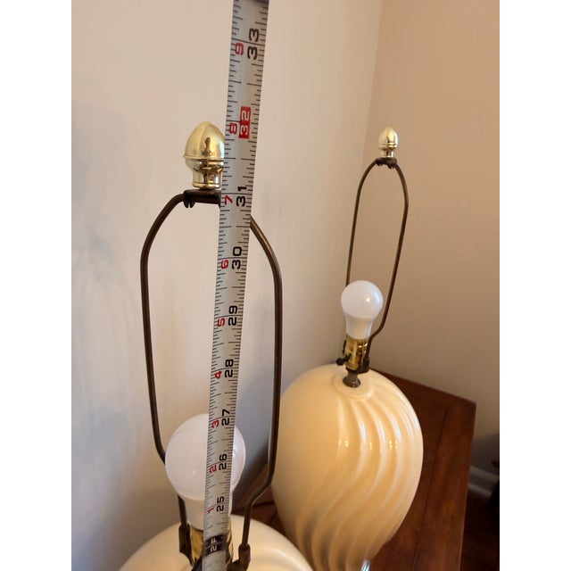 Elevate your space with this stunning pair of 1980s Postmodern large table lamps. They feature an elegant, fluid vertical...