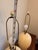 Elevate your space with this stunning pair of 1980s Postmodern large table lamps. They feature an elegant, fluid vertical...