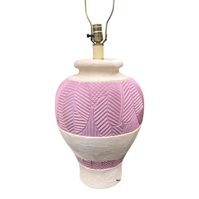 Nice vintage plaster lamp, cream with bands of incised pink tropical leaves. Looks like a lamp you’d find on a Golden...