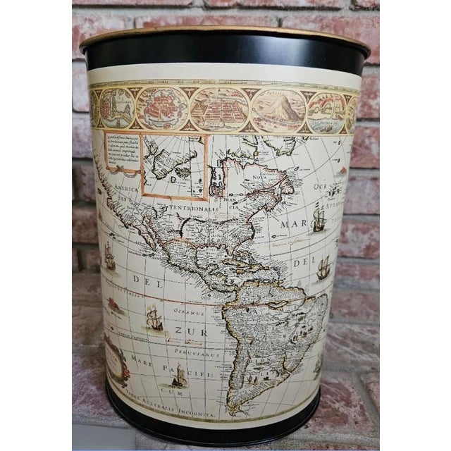 This marvelous vintage 1980s oval wastebasket is created in gorgeous black metal with gold rim and displays an ancient new...