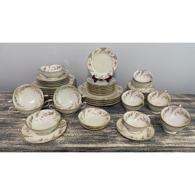 Vintage Thomas Ivory Bavaria china dinnerware set featuring an ivory ground, delicate pink rose sprays, ornate gold...