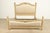 A stylish French Regency Louis XVI style king size bed frame In the manner of Henredon USA, Circa Late 20th Century Carved...