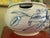 Beautiful blue and white handprinted ceramic glazed soup tureen with artists signature and lid. Holds liquid or solid food...