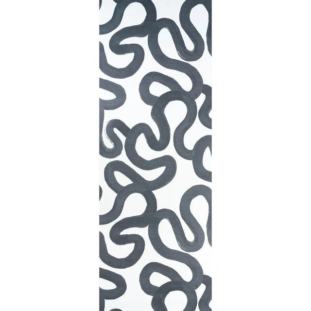 Hadiya Williams’ Trace wallpaper features a winding, gestural design based on an original acrylic painting. Its extra-...