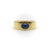 Circa the 1970’s, this 18k gold vintage Tiffany & Co. ring is a simple, wide cigar band with a central natural blue...