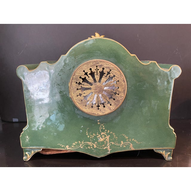 Hand painted French ceramic green gold and pink mantle clock with artist signed two beautiful young women scenes. Serves...