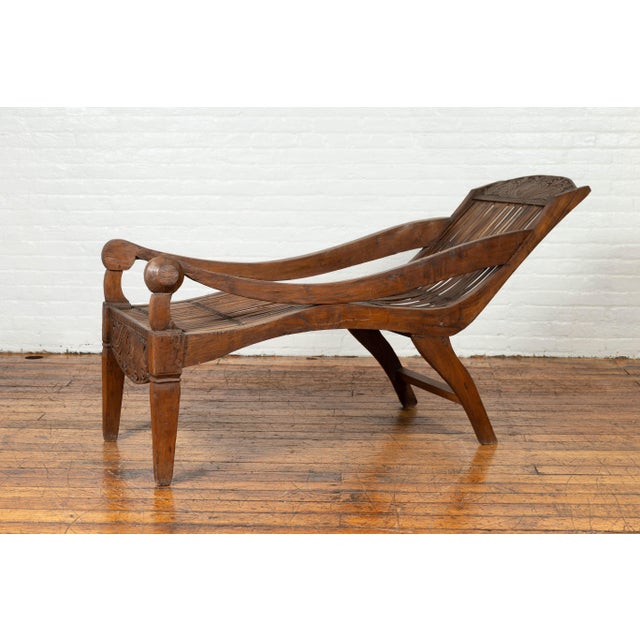 Antique Indonesian Reclining Plantation Chair with Bamboo Slats and Carved Décor For Sale - Image 10 of 10