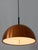 Minimalistic and elegant mid-century modern copper pendant lamp or hanging light. Designed and manufactured by staff &...