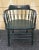 A late 19th Century to Early 20th Century Ebonized Oak barrel Captain Chair in good antique condition. Rock solid....