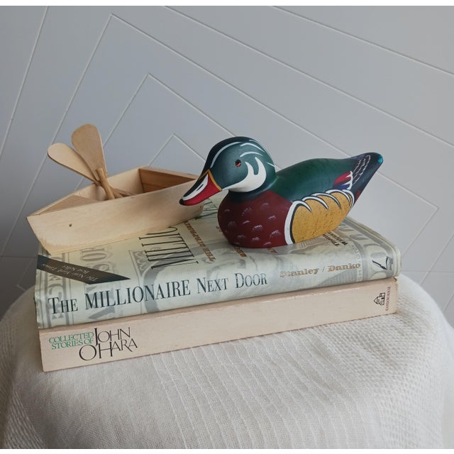 A truly exceptional find for the discerning collector, this Wood Duck Drake is a masterclass in American wildlife art....