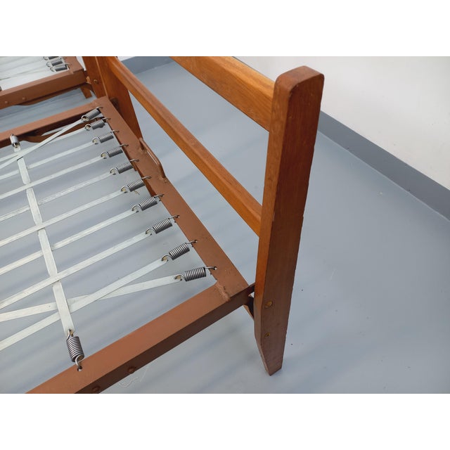 2 vintage stackable daybeds or daybeds from the 60s, in oak wood and metal, for 1 person, each is folding for easy...