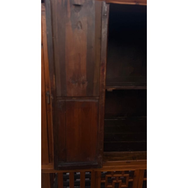Vintage Chinese Carved Wood Food Cabinet With Figural Panels & Geometric Latticework For Sale - Image 9 of 14