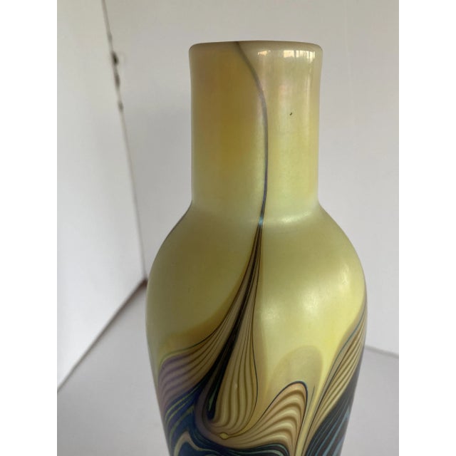 Iridescent 7 color art glass vase flower vase with a varied ripple pattern. Signed: "Lundberg Studio 1980"