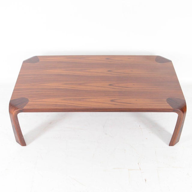 Rare Japanese coffee table produced by Tendo Mokko. Two exotic woods were used to create this table, resulting in two...