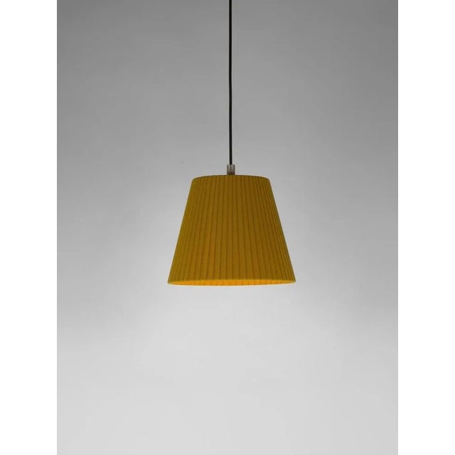 Mustard sísísí cónicas pt1 pendant lamp by santa & cole dimensions: d 20 x h 16 cm materials: metal, ribbon. Available in...