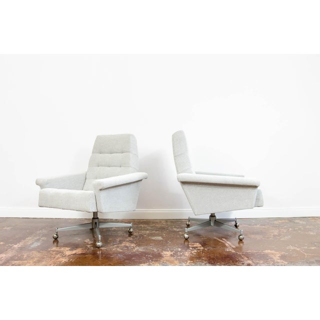 A pair of vintage armchairs from the UP Závody factory, manufactured in the 1970s, Czechoslovakia. The seat and backrest...