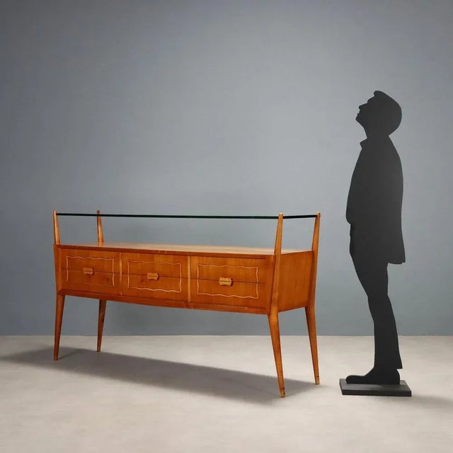 Elegant vintage Italian-made chest of drawers with cherry veneer, a glass top, and six drawers. In good overall condition,...