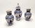 Striking and highly decorative Delft Blue garniture set dating to the 1950s, consisting of three beautifully hand-...