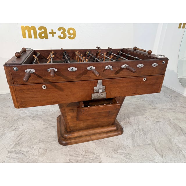 This is a rare and elegant vintage French foosball table dating from the 1950s or 1960s, crafted by Lux-Foot, a notable...
