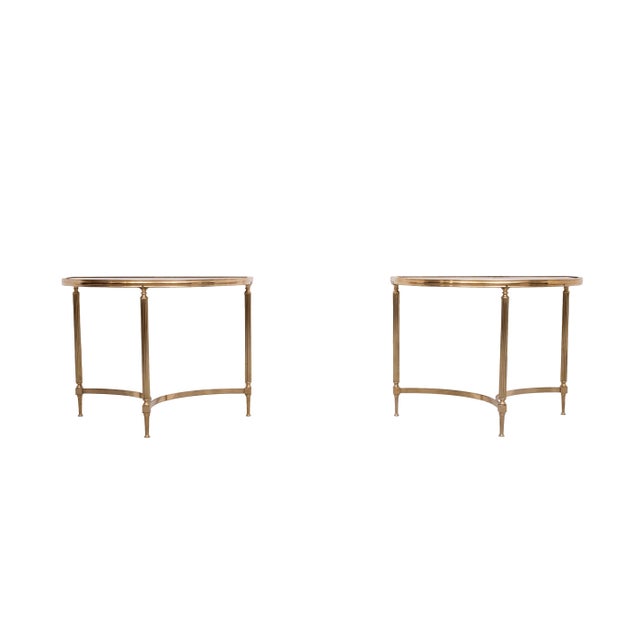 Beautiful top quality Demi- Lune Tables . Solid Brass comes with a thick Brown smoked Glass top . Super stylish . The best...